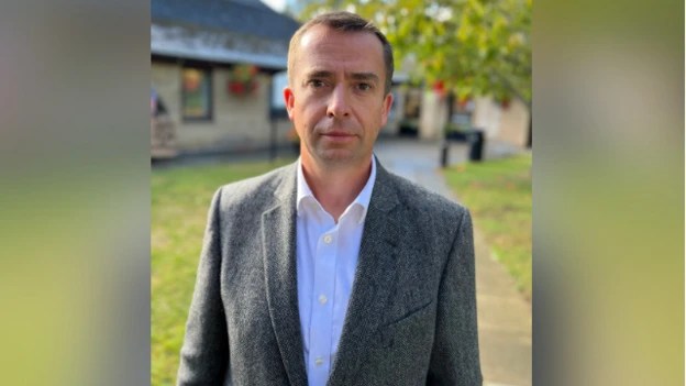 Calum Miller, MP for Bicester and Woodstock, outside Exeter Hall in Kidlington
