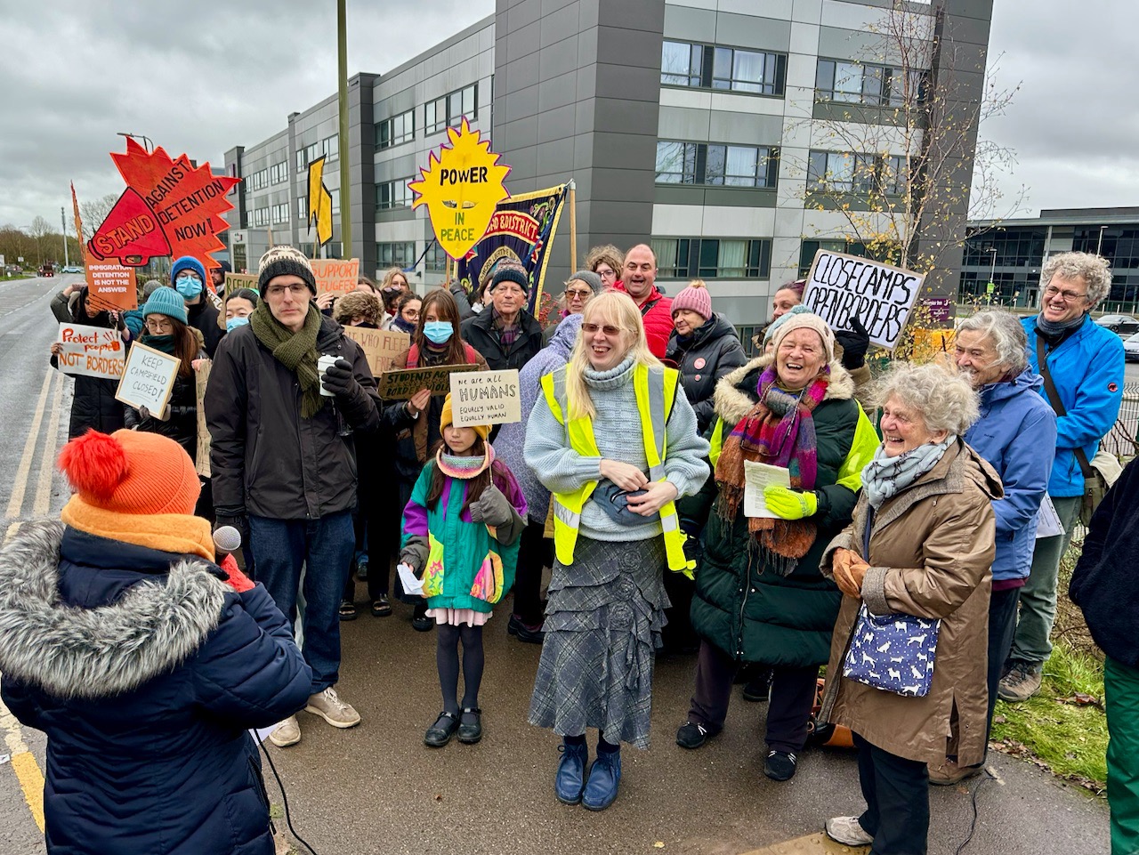 Helen from the No To Hassockfield Campaign addresses protesters outside Campsfield House