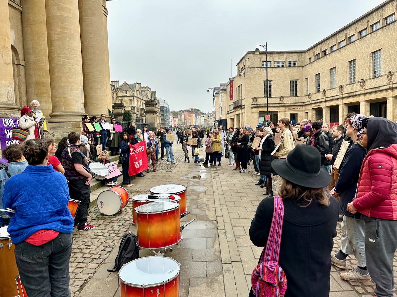 Large crowd gathered for the Feminism Knows No Borders protest at the Clarendon Building, Broad Street, Oxford city centre on 8 March, International Women's Day 2026.